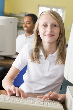 To use this stock image in your creative project, please select the size you need over to the right and click the "Add to Cart" button.
Your downloaded image will come with the Cutcaster watermark removed so don’t worry about the watermark you see on this page. Schoolgirl studying in front of a school computer stock photo, by Monkey Business Images