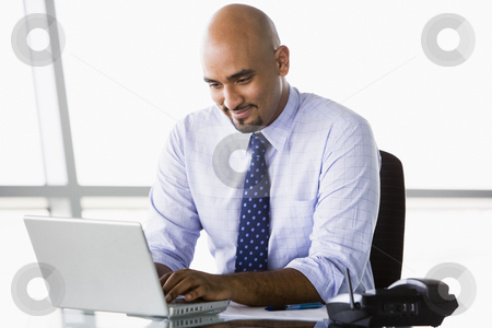 To use this stock image in your creative project, please select the size you need over to the right and click the "Add to Cart" button.
Your downloaded image will come with the Cutcaster watermark removed so don’t worry about the watermark you see on this page. Businessman working at laptop stock photo, Businessman working at laptop in office by Monkey Business Images