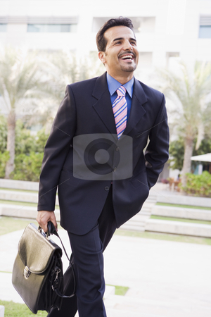 To use this stock image in your creative project, please select the size you need over to the right and click the "Add to Cart" button.
Your downloaded image will come with the Cutcaster watermark removed so don’t worry about the watermark you see on this page. Businessman walking to office stock photo, Businessman walking to office carrying briefcase by Monkey Business Images