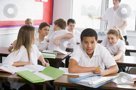 To use this stock image in your creative project, please select the size you need over to the right and click the "Add to Cart" button.
Your downloaded image will come with the Cutcaster watermark removed so don’t worry about the watermark you see on this page. High school students in class stock photo, by Monkey Business Images