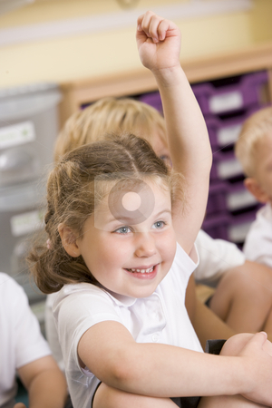 To use this stock image in your creative project, please select the size you need over to the right and click the "Add to Cart" button.
Your downloaded image will come with the Cutcaster watermark removed so don’t worry about the watermark you see on this page. A schoolgirl raises her hand in a primary class stock photo, by Monkey Business Images