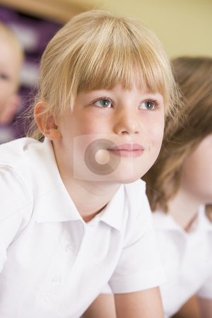 To use this stock image in your creative project, please select the size you need over to the right and click the "Add to Cart" button.
Your downloaded image will come with the Cutcaster watermark removed so don’t worry about the watermark you see on this page. Schoolgirl sitting in primary class stock photo, by Monkey Business Images