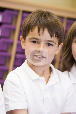 To use this stock image in your creative project, please select the size you need over to the right and click the "Add to Cart" button.
Your downloaded image will come with the Cutcaster watermark removed so don’t worry about the watermark you see on this page. Schoolboy sitting in primary class stock photo, by Monkey Business Images