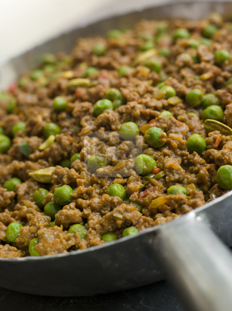 To use this stock image in your creative project, please select the size you need over to the right and click the "Add to Cart" button.
Your downloaded image will come with the Cutcaster watermark removed so don’t worry about the watermark you see on this page. Keema Curry and Peas stock photo, Pan of Keema Curry and Peas by Monkey Business Images