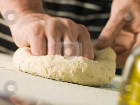 To use this stock image in your creative project, please select the size you need over to the right and click the "Add to Cart" button.
Your downloaded image will come with the Cutcaster watermark removed so don’t worry about the watermark you see on this page. Kneading Pizza Dough stock photo, Close up of man Kneading Pizza Dough by Monkey Business Images