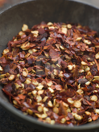 To use this stock image in your creative project, please select the size you need over to the right and click the "Add to Cart" button.
Your downloaded image will come with the Cutcaster watermark removed so don’t worry about the watermark you see on this page. Dish of Dried Chili Flakes stock photo, Close up of Dish of Dried Chili Flakes by Monkey Business Images
