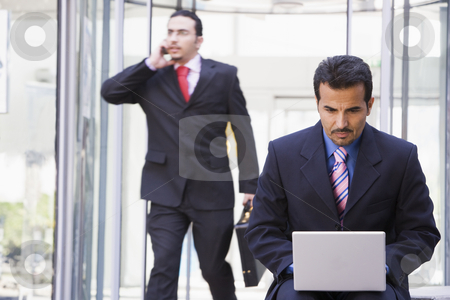 To use this stock image in your creative project, please select the size you need over to the right and click the "Add to Cart" button.
Your downloaded image will come with the Cutcaster watermark removed so don’t worry about the watermark you see on this page. Businessman working at laptop outside stock photo, Businessman working at laptop outside office by Monkey Business Images