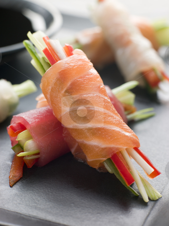 To use this stock image in your creative project, please select the size you need over to the right and click the "Add to Cart" button.
Your downloaded image will come with the Cutcaster watermark removed so don’t worry about the watermark you see on this page. Sashimi and Vegetable Rolls with Soy Sauce stock photo, Plate of Sashimi and Vegetable Rolls with Soy Sauce dip by Monkey Business Images