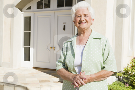 To use this stock image in your creative project, please select the size you need over to the right and click the "Add to Cart" button.
Your downloaded image will come with the Cutcaster watermark removed so don’t worry about the watermark you see on this page. Senior woman standing outside house stock photo, Senior woman standing outside front door of house by Monkey Business Images