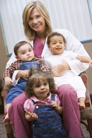 To use this stock image in your creative project, please select the size you need over to the right and click the "Add to Cart" button.
Your downloaded image will come with the Cutcaster watermark removed so don’t worry about the watermark you see on this page. Consultant with three IVF toddlers stock photo, Consultant holding three IVF conceived children by Monkey Business Images