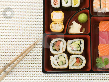 To use this stock image in your creative project, please select the size you need over to the right and click the "Add to Cart" button.
Your downloaded image will come with the Cutcaster watermark removed so don’t worry about the watermark you see on this page. Selection of Sushi In a Bento Box stock photo, Selection of Sushi In a Bento Box with chopsticks by Monkey Business Images