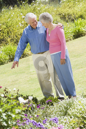 To use this stock image in your creative project, please select the size you need over to the right and click the "Add to Cart" button.
Your downloaded image will come with the Cutcaster watermark removed so don’t worry about the watermark you see on this page. Senior couple in garden stock photo, Senior couple in garden admiring flowerbed by Monkey Business Images
