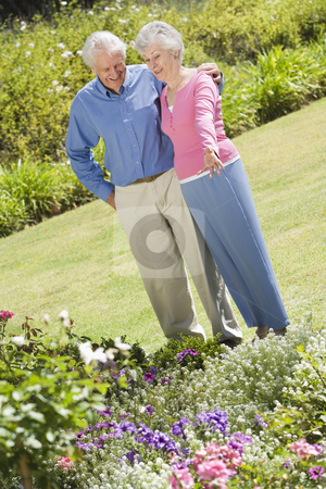To use this stock image in your creative project, please select the size you need over to the right and click the "Add to Cart" button.
Your downloaded image will come with the Cutcaster watermark removed so don’t worry about the watermark you see on this page. Senior couple standing in garden stock photo, Senior couple standing in garden admiring flowerbed by Monkey Business Images