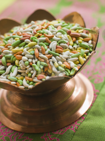 To use this stock image in your creative project, please select the size you need over to the right and click the "Add to Cart" button.
Your downloaded image will come with the Cutcaster watermark removed so don’t worry about the watermark you see on this page. Dish of Sugared Fennel Seeds stock photo, Bronze dish of sugared fennel seeds by Monkey Business Images