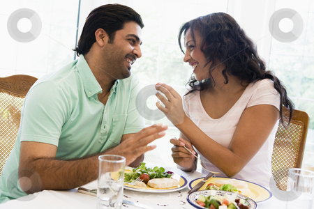To use this stock image in your creative project, please select the size you need over to the right and click the "Add to Cart" button.
Your downloaded image will come with the Cutcaster watermark removed so don’t worry about the watermark you see on this page. A Middle Eastern couple enjoying a meal together stock photo, by Monkey Business Images