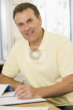 To use this stock image in your creative project, please select the size you need over to the right and click the "Add to Cart" button.
Your downloaded image will come with the Cutcaster watermark removed so don’t worry about the watermark you see on this page. Male adult student studying on campus stock photo, by Monkey Business Images