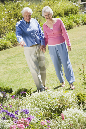 To use this stock image in your creative project, please select the size you need over to the right and click the "Add to Cart" button.
Your downloaded image will come with the Cutcaster watermark removed so don’t worry about the watermark you see on this page. Senior couple walking in garden stock photo, Senior couple walking in garden admiring flowerbeds by Monkey Business Images