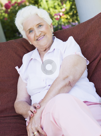 To use this stock image in your creative project, please select the size you need over to the right and click the "Add to Cart" button.
Your downloaded image will come with the Cutcaster watermark removed so don’t worry about the watermark you see on this page. Senior woman sitting on garden chair stock photo, Senior woman sitting on garden chair smiling to camera by Monkey Business Images