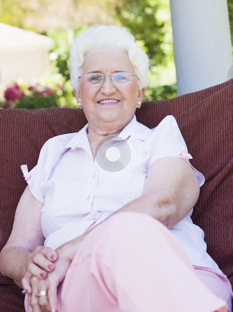 To use this stock image in your creative project, please select the size you need over to the right and click the "Add to Cart" button.
Your downloaded image will come with the Cutcaster watermark removed so don’t worry about the watermark you see on this page. Senior woman sitting on garden chair stock photo, Senior woman sitting on garden chair smiling to camera by Monkey Business Images