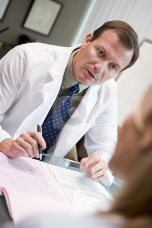 To use this stock image in your creative project, please select the size you need over to the right and click the "Add to Cart" button.
Your downloaded image will come with the Cutcaster watermark removed so don’t worry about the watermark you see on this page. Doctor in discussion with patient in IVF clinic stock photo, by Monkey Business Images