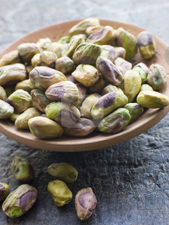To use this stock image in your creative project, please select the size you need over to the right and click the "Add to Cart" button.
Your downloaded image will come with the Cutcaster watermark removed so don’t worry about the watermark you see on this page. Dish of Pistachio Nuts stock photo, Close up Dish of Pistachio Nuts by Monkey Business Images