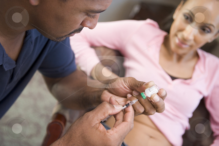 To use this stock image in your creative project, please select the size you need over to the right and click the "Add to Cart" button.
Your downloaded image will come with the Cutcaster watermark removed so don’t worry about the watermark you see on this page. Man helping woman inject drugs to achieve pregnancy stock photo, Man helping woman inject drugs to achieve pregnancy at home by Monkey Business Images