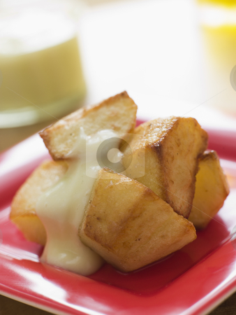 To use this stock image in your creative project, please select the size you need over to the right and click the "Add to Cart" button.
Your downloaded image will come with the Cutcaster watermark removed so don’t worry about the watermark you see on this page. Patatas Allioli stock photo, by Monkey Business Images
