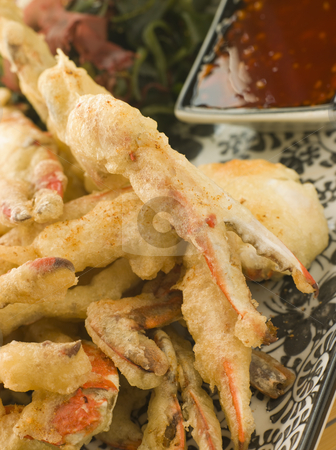 To use this stock image in your creative project, please select the size you need over to the right and click the "Add to Cart" button.
Your downloaded image will come with the Cutcaster watermark removed so don’t worry about the watermark you see on this page. Tempura of Soft Shell Crab with Chili Sauce and Seaweed salad stock photo, Plate of Tempura of Soft Shell Crab with Chili Sauce and Seaweed salad by Monkey Business Images