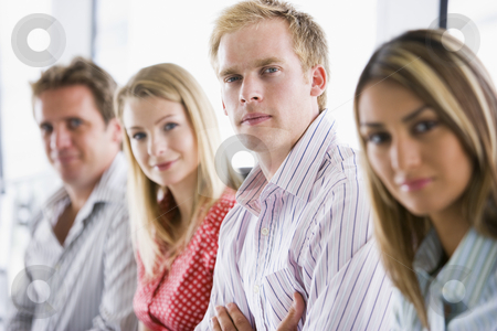 To use this stock image in your creative project, please select the size you need over to the right and click the "Add to Cart" button.
Your downloaded image will come with the Cutcaster watermark removed so don’t worry about the watermark you see on this page. Four businesspeople sitting indoors smiling stock photo, by Monkey Business Images