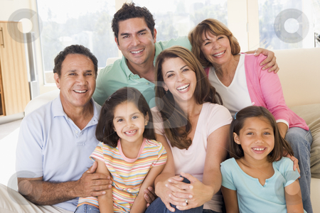 To use this stock image in your creative project, please select the size you need over to the right and click the "Add to Cart" button.
Your downloaded image will come with the Cutcaster watermark removed so don’t worry about the watermark you see on this page. Extended family in living room smiling stock photo, by Monkey Business Images