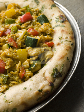 To use this stock image in your creative project, please select the size you need over to the right and click the "Add to Cart" button.
Your downloaded image will come with the Cutcaster watermark removed so don’t worry about the watermark you see on this page. Indian Scrambled Eggs and Naan Bread stock photo, Plate of Indian Scrambled Eggs and Naan Bread by Monkey Business Images
