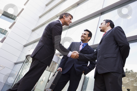 To use this stock image in your creative project, please select the size you need over to the right and click the "Add to Cart" button.
Your downloaded image will come with the Cutcaster watermark removed so don’t worry about the watermark you see on this page. Business people shaking hands outside office stock photo, Business people shaking hands outside modern office building by Monkey Business Images