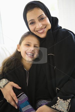 To use this stock image in your creative project, please select the size you need over to the right and click the "Add to Cart" button.
Your downloaded image will come with the Cutcaster watermark removed so don’t worry about the watermark you see on this page. A Middle Eastern woman with her granddaughter stock photo, by Monkey Business Images
