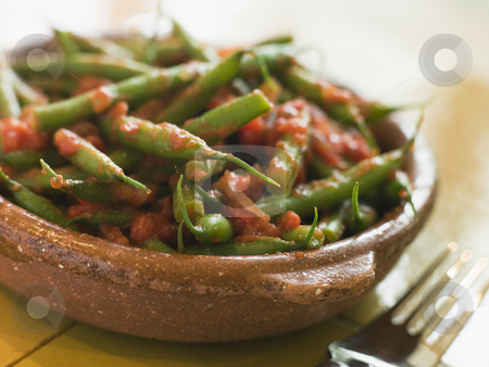 To use this stock image in your creative project, please select the size you need over to the right and click the "Add to Cart" button.
Your downloaded image will come with the Cutcaster watermark removed so don’t worry about the watermark you see on this page. Green Beans with a Tomato Salsa stock photo, by Monkey Business Images