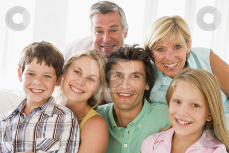 To use this stock image in your creative project, please select the size you need over to the right and click the "Add to Cart" button.
Your downloaded image will come with the Cutcaster watermark removed so don’t worry about the watermark you see on this page. Family indoors together smiling stock photo, by Monkey Business Images