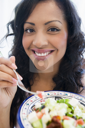 To use this stock image in your creative project, please select the size you need over to the right and click the "Add to Cart" button.
Your downloaded image will come with the Cutcaster watermark removed so don’t worry about the watermark you see on this page. A South American holding a salad up to the camera stock photo, by Monkey Business Images