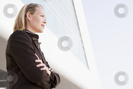 To use this stock image in your creative project, please select the size you need over to the right and click the "Add to Cart" button.
Your downloaded image will come with the Cutcaster watermark removed so don’t worry about the watermark you see on this page. Businesswoman standing outdoors by building stock photo, by Monkey Business Images
