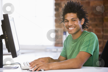 To use this stock image in your creative project, please select the size you need over to the right and click the "Add to Cart" button.
Your downloaded image will come with the Cutcaster watermark removed so don’t worry about the watermark you see on this page. Businessman in office typing on computer smiling stock photo, by Monkey Business Images