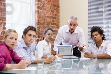 To use this stock image in your creative project, please select the size you need over to the right and click the "Add to Cart" button.
Your downloaded image will come with the Cutcaster watermark removed so don’t worry about the watermark you see on this page. Five businesspeople in boardroom with laptop stock photo, by Monkey Business Images