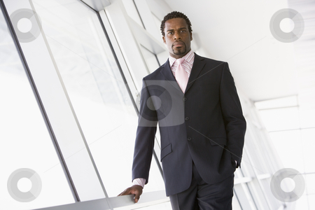 To use this stock image in your creative project, please select the size you need over to the right and click the "Add to Cart" button.
Your downloaded image will come with the Cutcaster watermark removed so don’t worry about the watermark you see on this page. Businessman standing in corridor stock photo, by Monkey Business Images