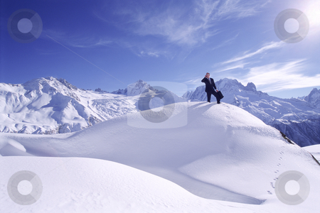 To use this stock image in your creative project, please select the size you need over to the right and click the "Add to Cart" button.
Your downloaded image will come with the Cutcaster watermark removed so don’t worry about the watermark you see on this page. Businessman outdoors on snowy mountain using cellular phone stock photo, by Monkey Business Images