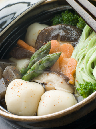 To use this stock image in your creative project, please select the size you need over to the right and click the "Add to Cart" button.
Your downloaded image will come with the Cutcaster watermark removed so don’t worry about the watermark you see on this page. Fish Ball Stew Pot with Vegetables and Spinach Noodles stock photo, Close up of Fish Ball Stew Pot with Vegetables and Spinach Noodles by Monkey Business Images