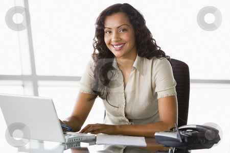 To use this stock image in your creative project, please select the size you need over to the right and click the "Add to Cart" button.
Your downloaded image will come with the Cutcaster watermark removed so don’t worry about the watermark you see on this page. Businesswoman working at desk stock photo, Businesswoman working at desk in office by Monkey Business Images