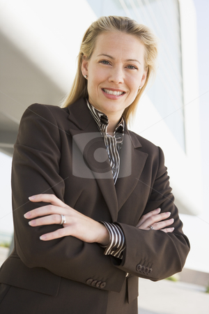 To use this stock image in your creative project, please select the size you need over to the right and click the "Add to Cart" button.
Your downloaded image will come with the Cutcaster watermark removed so don’t worry about the watermark you see on this page. Businesswoman standing outdoors by building smiling stock photo, by Monkey Business Images