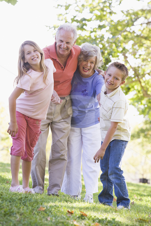To use this stock image in your creative project, please select the size you need over to the right and click the "Add to Cart" button.
Your downloaded image will come with the Cutcaster watermark removed so don’t worry about the watermark you see on this page. Grandparents laughing with grandchildren stock photo, by Monkey Business Images