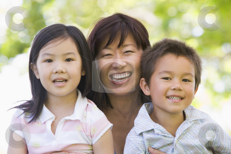To use this stock image in your creative project, please select the size you need over to the right and click the "Add to Cart" button.
Your downloaded image will come with the Cutcaster watermark removed so don’t worry about the watermark you see on this page. Grandmother laughing with grandchildren stock photo, by Monkey Business Images
