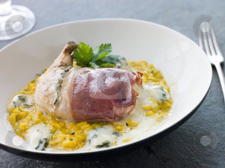 To use this stock image in your creative project, please select the size you need over to the right and click the "Add to Cart" button.
Your downloaded image will come with the Cutcaster watermark removed so don’t worry about the watermark you see on this page. Chicken Breast wrapped in Parma Ham with Gorgonzola Cheese and R stock photo, by Monkey Business Images