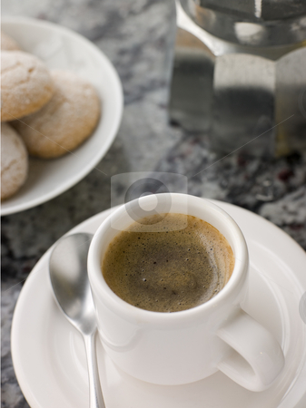 To use this stock image in your creative project, please select the size you need over to the right and click the "Add to Cart" button.
Your downloaded image will come with the Cutcaster watermark removed so don’t worry about the watermark you see on this page. Cup of Espresso Coffee with Amaretti Biscuit stock photo, by Monkey Business Images