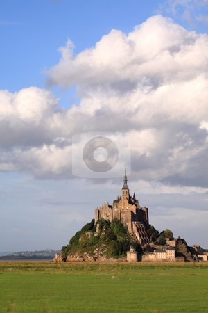 To use this stock image in your creative project, please select the size you need over to the right and click the "Add to Cart" button.
Your downloaded image will come with the Cutcaster watermark removed so don’t worry about the watermark you see on this page. Mont-Saint-Michel stock photo, Le Mont-Saint-Michel in the daylight, side view by Tilo