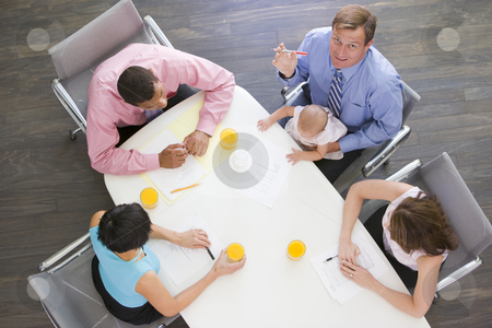 To use this stock image in your creative project, please select the size you need over to the right and click the "Add to Cart" button.
Your downloaded image will come with the Cutcaster watermark removed so don’t worry about the watermark you see on this page. Four businesspeople in boardroom with one holding a baby stock photo, by Monkey Business Images